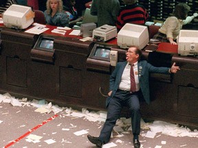 An exhausted trader slumps in his chair at the Toronto Stock Exchange on Black Monday, Oct. 19, 1987.